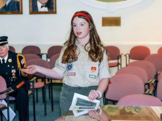Scouts of America Troop 321's Bella Tirri presents in Westwood on Dec. 16, 2025. John Snyder photo.