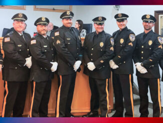 Receiving new badges at the Jan. 19 meeting of the Township of Washington mayor and council: With WTPD Chief Arsenio Pecora are Capt. Michael Glock, Lt. Richard Parsells, Sgt. Michael Ferrarini, Sgt. Christopher Osenbruck, Cpl. Peter Vereb, Cpl. Michael Sinatra (all promoted), and P.O. Justin Boesch. Courtesy photo.