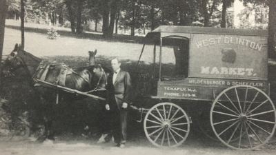 Mildenberger has gone from butcher’s apron to suit and bow tie in order to make his rounds.
