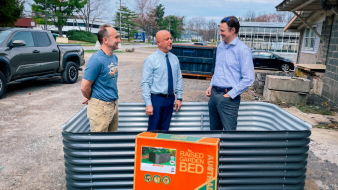 Matt Epstein, manager of the Montvale Farmstand, joins Mayor Mike Ghassali and Administrator Joe Voytus inside one of the 40 raised-bed containers planned for the borough’s new community garden. Photo by Mike Olohan.