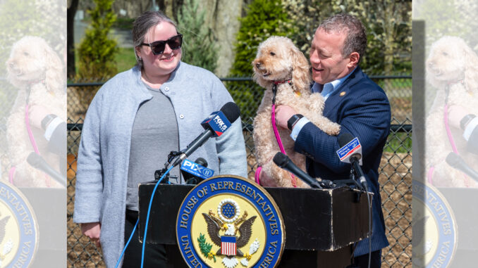 Westwood Councilwoman Erin Collins hosts Rep. Josh Gottheimer and his dog Rosie at Westvale Park on April 7, during Animal Cruelty Prevention Month. Gottheimer outlined new federal proposals targeting gaps in how animal abuse cases are prosecuted, particularly when they cross state lines or occur on federal property. John Snyder photo.