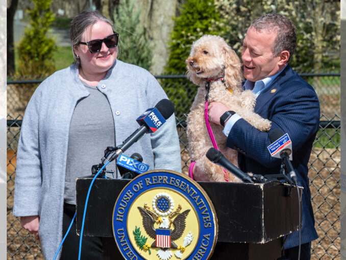 Westwood Councilwoman Erin Collins hosts Rep. Josh Gottheimer and his dog Rosie at Westvale Park on April 7, during Animal Cruelty Prevention Month. Gottheimer outlined new federal proposals targeting gaps in how animal abuse cases are prosecuted, particularly when they cross state lines or occur on federal property. John Snyder photo.