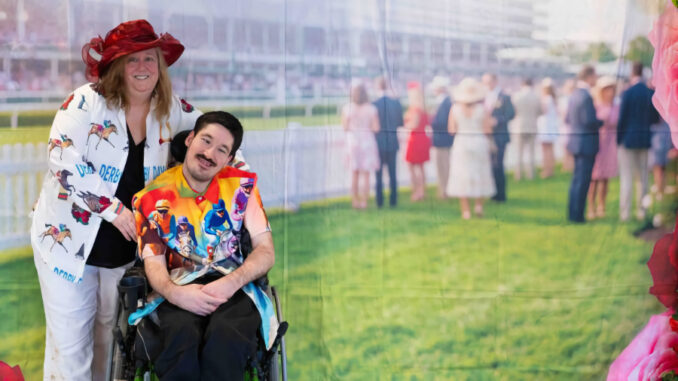 Joey poses with his mother and guardian, Kim C., during New Concepts for Living’s Kentucky Derby-themed prom at the NCFL Achievement Center in Paramus on May 8.