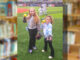 Now pitching for the New York Boulders… Berkeley school sisters Scarlett Hlavaty, a fourth grader, and Madelyn Hlavaty, a first grader, throw out a ceremonial first pitch during the “Rockland Boulders Reading Challenge” celebration at Clover Stadium as their father, Kevin Hlavaty, prepares to catch both balls at once. Courtesy photo