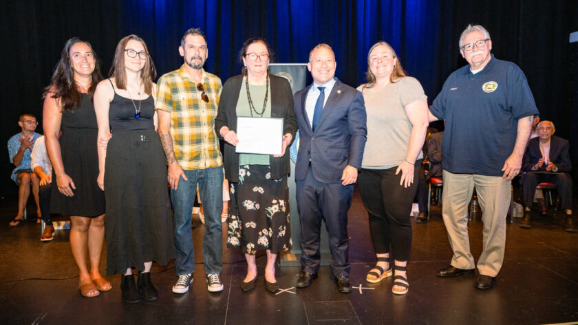 From left, Councilmember Lauren Letizia; Helen Whalen’s granddaughter Tatiana Whalen; grandson Marc Giannotti; daughter Kathleen Whalen, who accepted the posthumous Hometown Hero award; U.S. Rep. Josh Gottheimer; Councilmember Erin Collins; and Mayor Ray Arroyo. Letizia, Collins, and Arroyo helped initiate Whalen’s nomination.