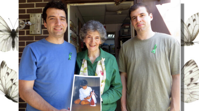 GROWING THE MOVEMENT: Rosemarie Birri D'Alessandro holds a picture of her daughter Joan with sons Michael and John in 2019. File photo.