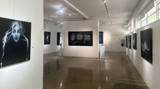 “Smoke and Steel,” now on view at Sfumato Gallery in Westwood, pairs atmospheric paintings by Mher Khachatryan, known as The Smoke Artist, with steel sculptures by Karen Akhikyan. The exhibition explores movement, transformation, permanence and impermanence. Courtesy photo.