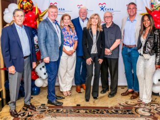 Charles “Chip” Giamo, a longtime Bergen County CASA volunteer whose example inspired Township of Washington resident Nilene Evans to become an Advocate in 2016. Giamo died July 25 at 81. In the group photo, from a 2023 fundraiser, Chip is at left with Bergen CASA Board of Trustees members Michael Edwards, Cathy Skinner, Thomas Ayers, Lucy Rosen, Joseph Preziosi, Marc Blatt and Zone LeSane. Bergen CASA photo.