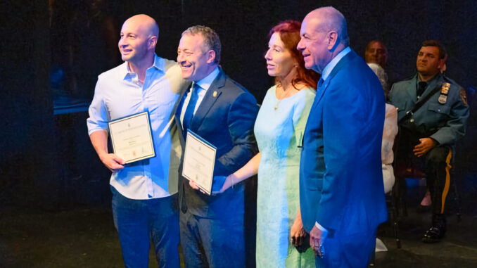 From left, Northvale athletic director and physical education teacher Mike Shulman, U.S. Rep. Josh Gottheimer, Northvale school nurse Joan Bowman, and Bergen County Clerk John Hogan mark Bowman and Shulman’s recognition as Fifth District Hometown Heroes at the Hackensack Performing Arts Center on July 31. Bowman and Shulman were honored for helping save a middle school basketball player who suffered cardiac arrest during a game.