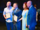 From left, Northvale athletic director and physical education teacher Mike Shulman, U.S. Rep. Josh Gottheimer, Northvale school nurse Joan Bowman, and Bergen County Clerk John Hogan mark Bowman and Shulman’s recognition as Fifth District Hometown Heroes at the Hackensack Performing Arts Center on July 31. Bowman and Shulman were honored for helping save a middle school basketball player who suffered cardiac arrest during a game.