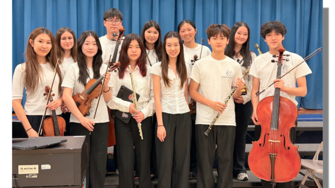 Youth volunteers with Solis and Luna Arts recently brought a therapeutic music program to North Cliff Elementary School, sharing performances designed to use music as a way to connect, inspire, and bring comfort. Courtesy photo.