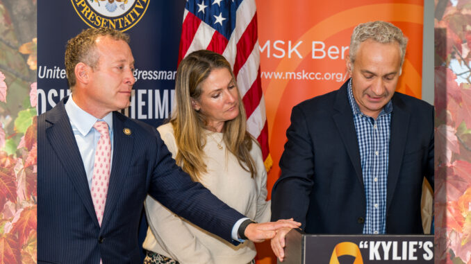 U.S. Rep. Josh Gottheimer, left, joins Hayley and Adam Kupperman at Memorial Sloan Kettering Bergen in Montvale on Sept. 22 as Adam shares their daughter Kylie’s story. The bipartisan “Kylie’s Law” would give pediatric cancer experts a greater voice in state cancer planning. Photo by John Snyder.