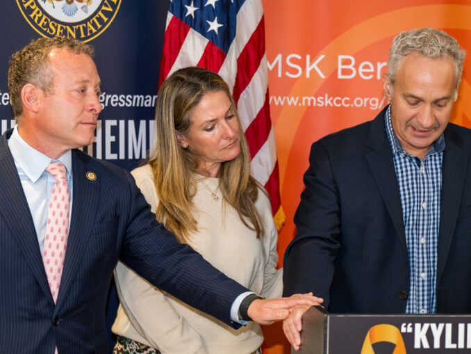 U.S. Rep. Josh Gottheimer, left, joins Hayley and Adam Kupperman at Memorial Sloan Kettering Bergen in Montvale on Sept. 22 as Adam shares their daughter Kylie’s story. The bipartisan “Kylie’s Law” would give pediatric cancer experts a greater voice in state cancer planning. Photo by John Snyder.