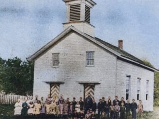 The student body of Hillsdale’s first school with teacher William W. Banta. The young teacher was in charge of this entire group in the one-room schoolhouse.