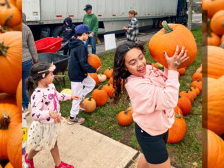 Fundraising Committee chair Cindy Micucci and church Treasurer Jack Rickly lead the project, supported by about 20 volunteers who arrange the display and staff the sales table throughout the month. Before sales can begin, friends, relatives and students from area high schools help unload the pumpkins from a tractor-trailer. Courtesy photo