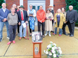 A PROMISE KEPT: Rudolph “Rudy” Jaeger, in red tie, gathers with family and friends Sept. 26 outside Central Unitarian Church in Westwood to mark his 39th wedding anniversary with his late wife, Susan Ulich Jaeger. The Rev. Andrée Cornelia Mol, center, officiated.