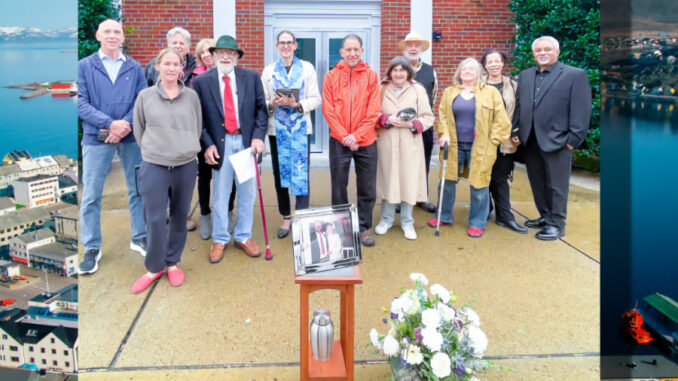 A PROMISE KEPT: Rudolph “Rudy” Jaeger, in red tie, gathers with family and friends Sept. 26 outside Central Unitarian Church in Westwood to mark his 39th wedding anniversary with his late wife, Susan Ulich Jaeger. The Rev. Andrée Cornelia Mol, center, officiated.