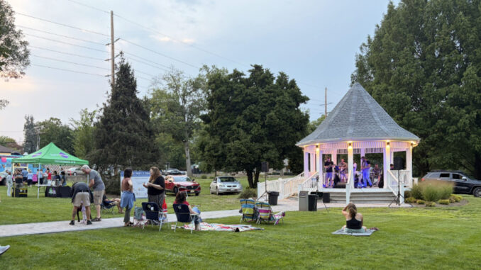 The Possums perform at the Nancy Woods Memorial Gazebo in Demarest during Feeding Neighbors Night on Aug. 12. At the event, student reporter Karin Lee polled residents about climate change concerns and their awareness of local resilience efforts. Photo by Karin Lee.